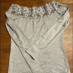 Worn once. Shirt fits small